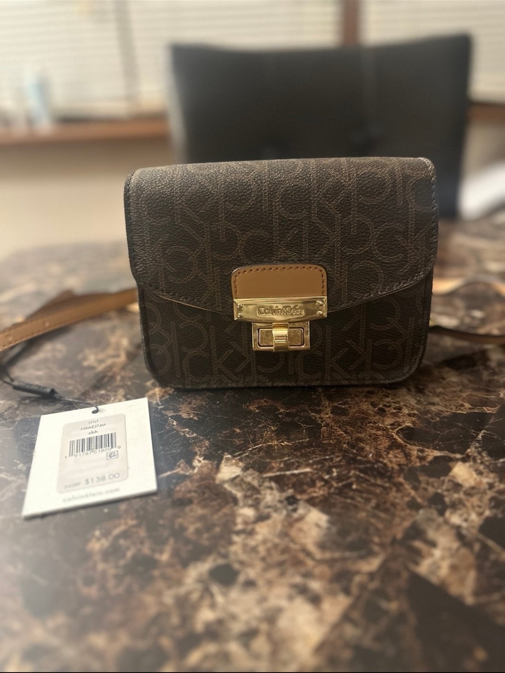 Brand new with tag Calvin Klein Crossbody purse with Gold Hardware